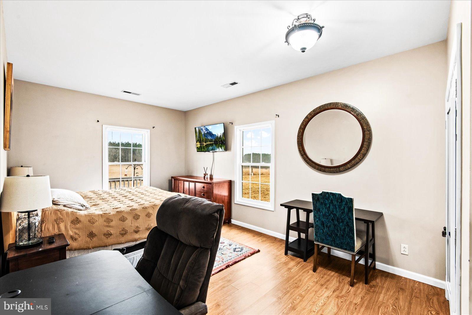 11310 St Just Road Unionville, VA 22567 - Photo 14 of 40 Cozy bedroom with natural light and views.