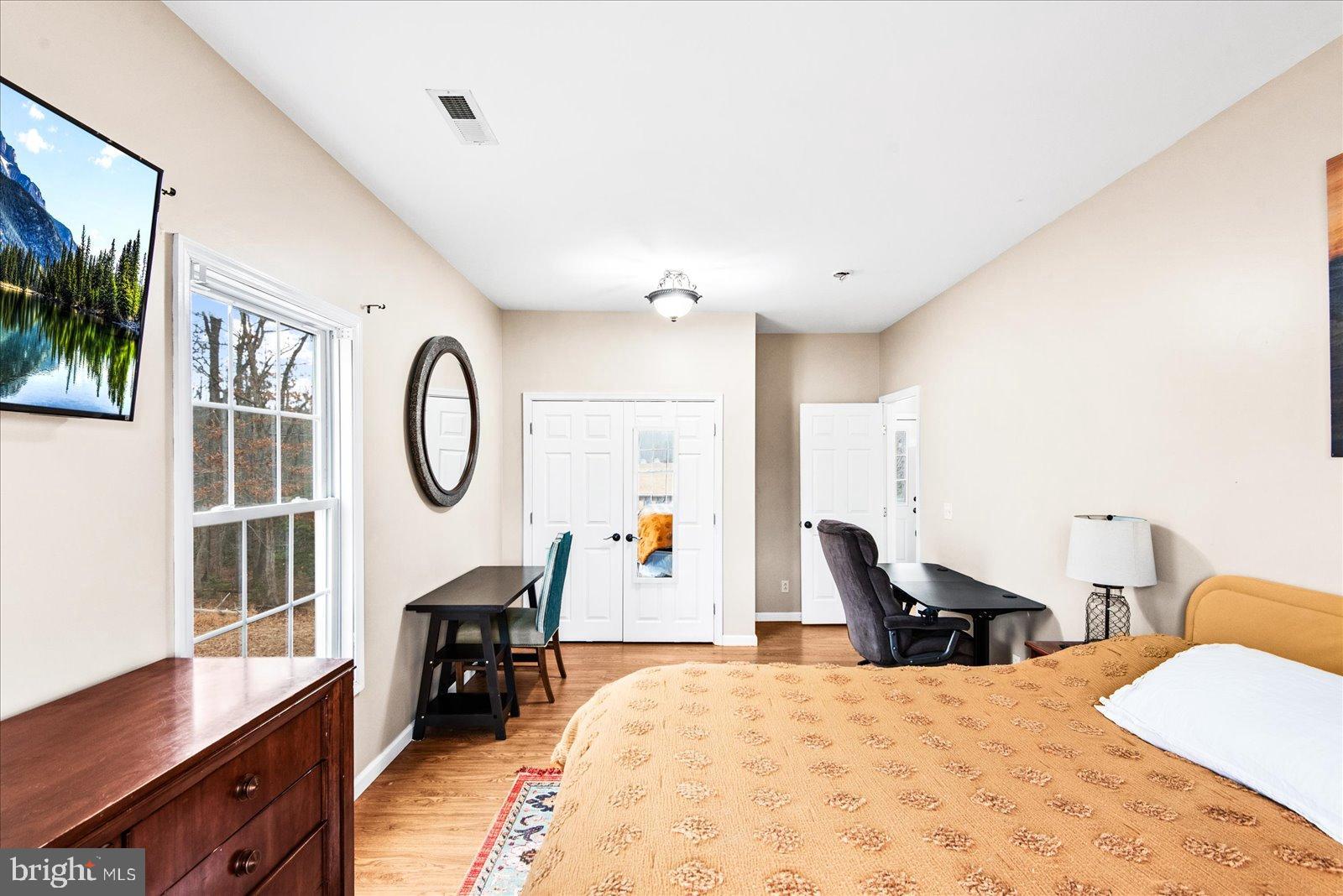 11310 St Just Road Unionville, VA 22567 - Photo 15 of 40 Bright and inviting bedroom with natural light.