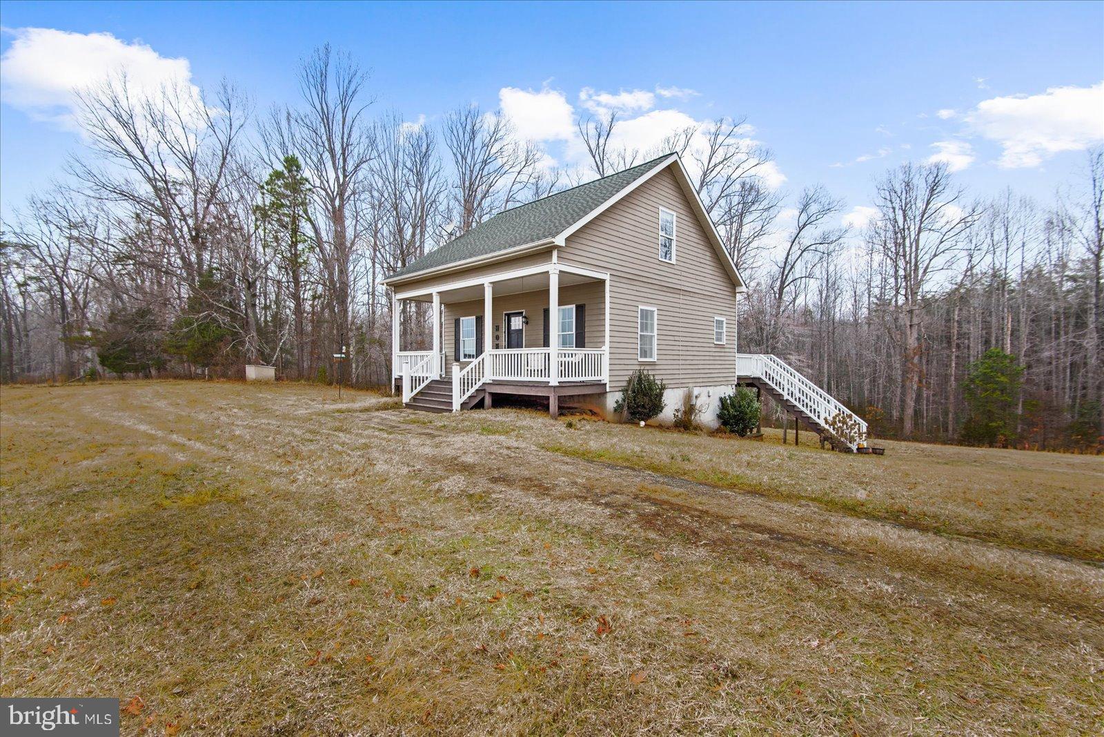 11310 St Just Road Unionville, VA 22567 - Photo 2 of 40 Charming home nestled in serene woods.
