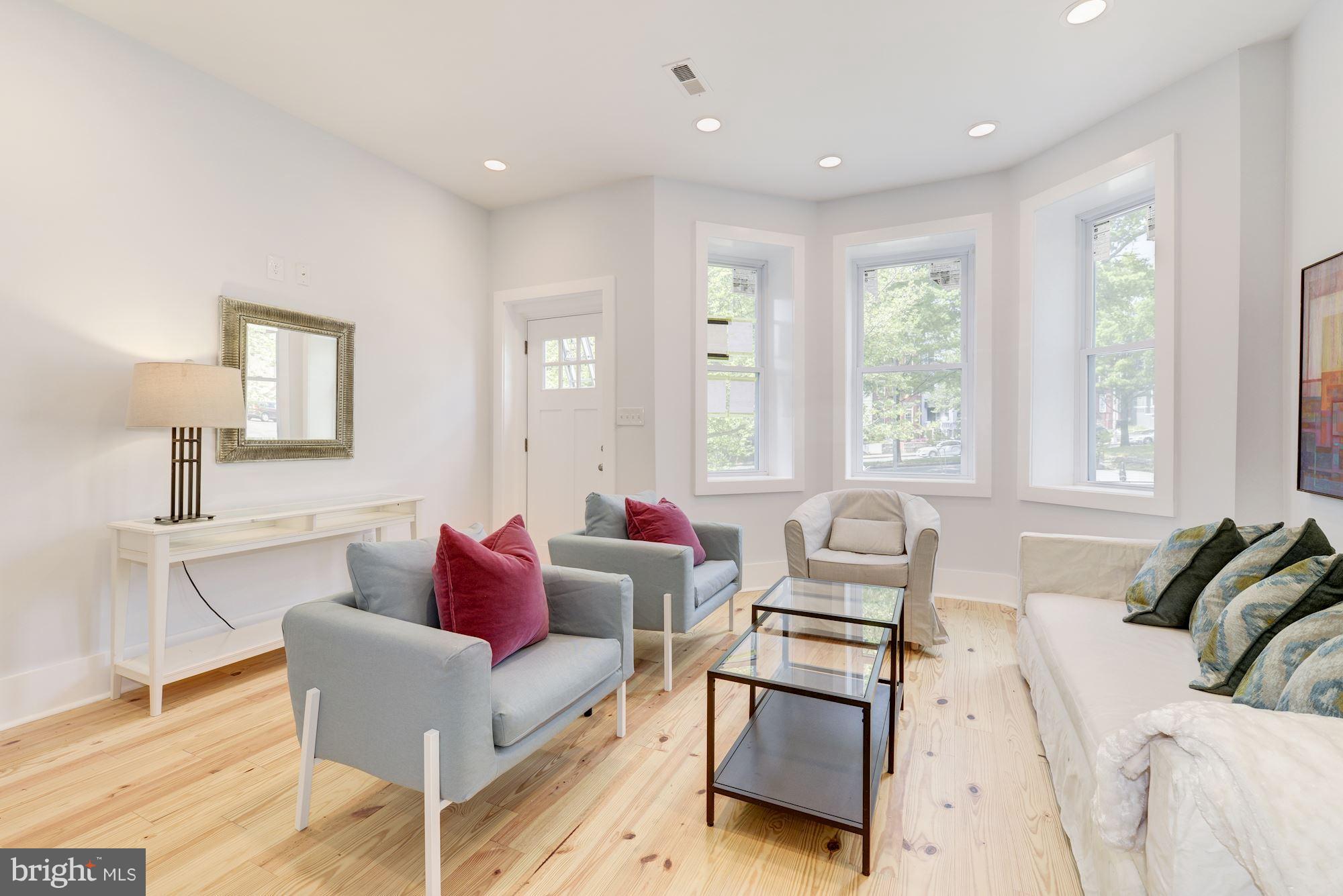 35 U Street Northeast Washington, DC 20002 - Photo 2 of 29 Light filled LR w bay window; historic, new floors