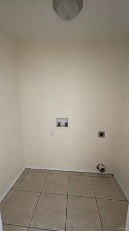 a room with a sink and cabinets