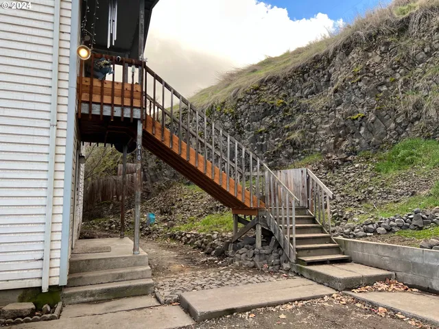 a view of a balcony with an outdoor space