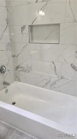 a bathroom with a bathtub
