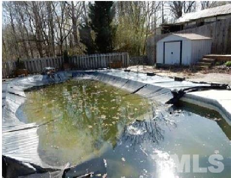 1027 Cavel Chub Lake Road Roxboro, NC 27574 - Photo 5 of 17 a view of swimming pool yard