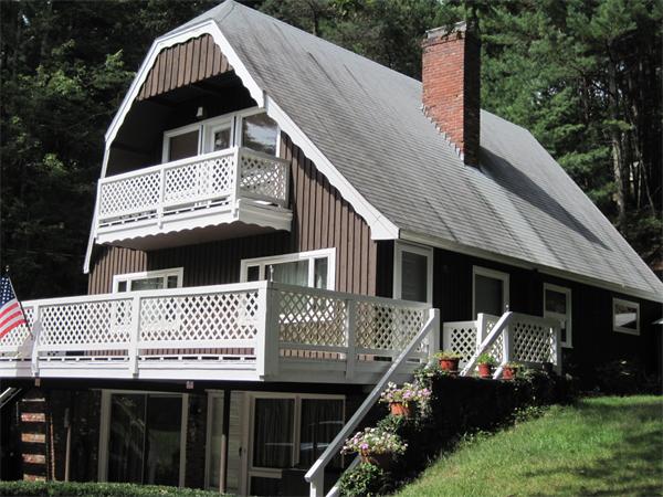 36 Grove Street Marshfield, MA 02050 - Photo 1 of 11 a front view of a house with a yard