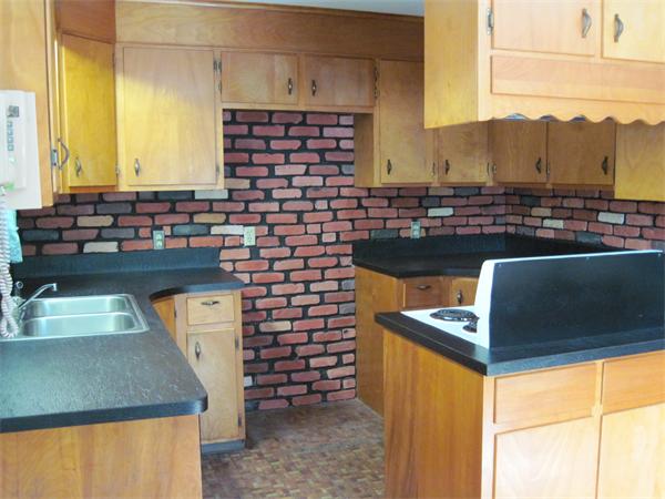 36 Grove Street Marshfield, MA 02050 - Photo 4 of 11 a bathroom with a sink and a mirror