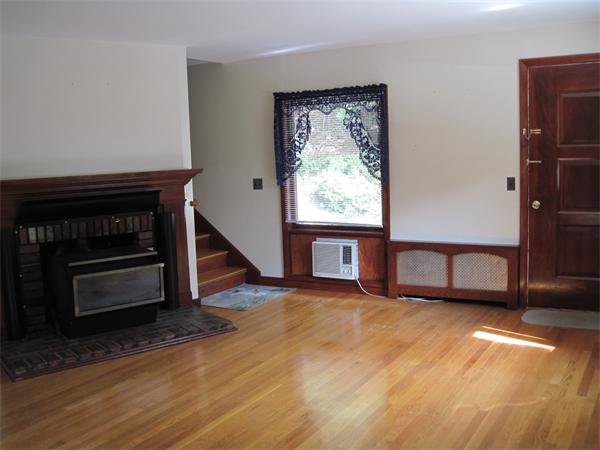 36 Grove Street Marshfield, MA 02050 - Photo 5 of 11 a view of an empty room with wooden floor and a window