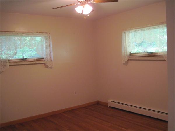 36 Grove Street Marshfield, MA 02050 - Photo 7 of 11 an empty room with a window