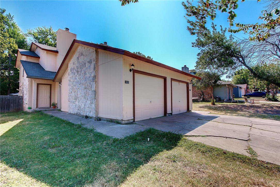 a backyard of a house with seating space