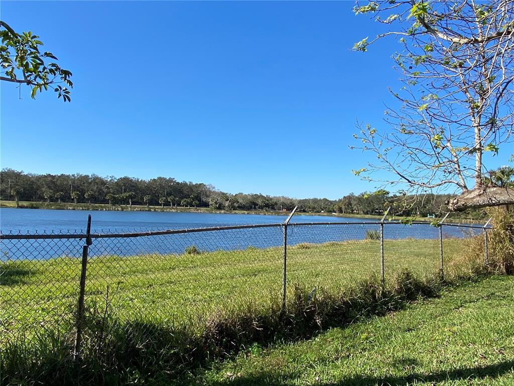 910 Lake Avenue Edgewater, FL 32132 - Photo 4 of 23 a view of a garden with a lake view