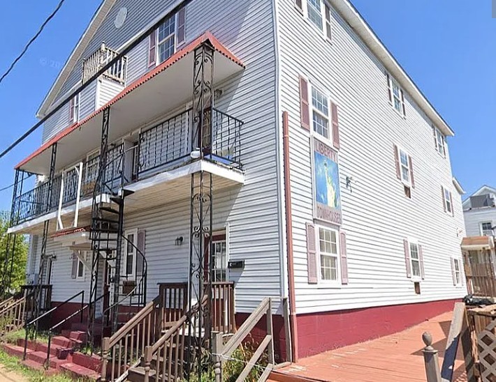 a view of a house with a balcony