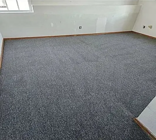 a view of a refrigerator in a room