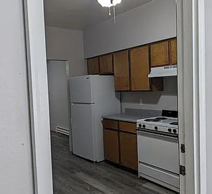 105 South Liberty Street Marion, IL 62959 - Photo 7 of 13 a kitchen with a refrigerator and a stove