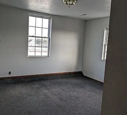 an empty room with a window