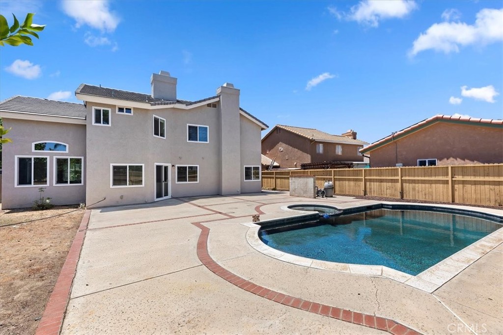 9152 Owari Lane Riverside, CA 92508 - Photo 17 of 20 a view of a house with pool table and chairs