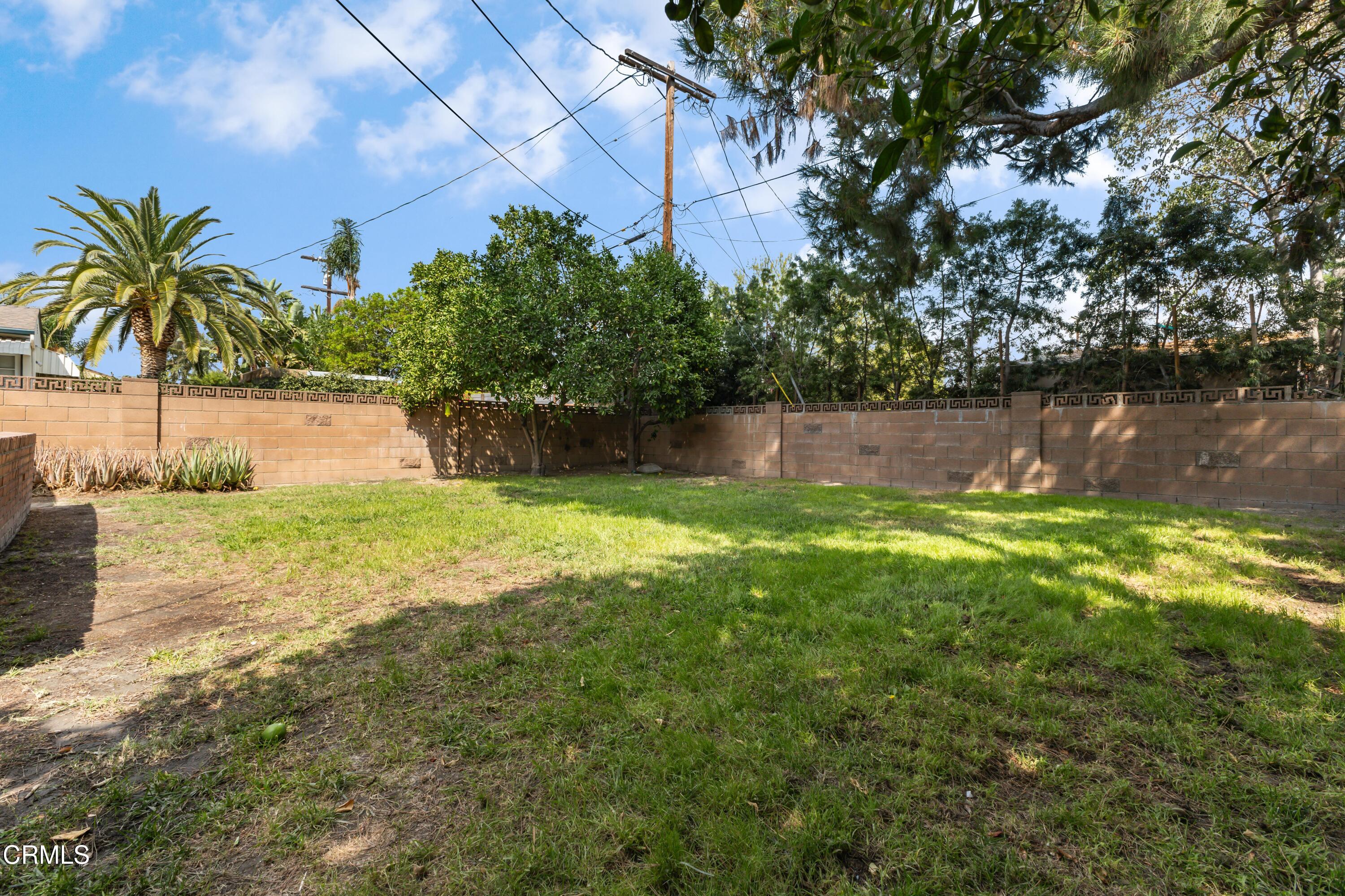 5622 Bellingham Avenue Valley Village, CA 91607 - Photo 22 of 24 a swimming pool with green space