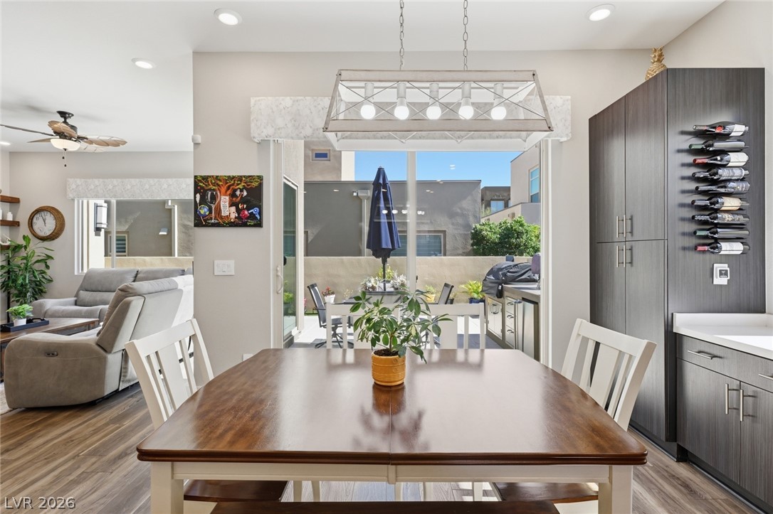 4246 Swift Street Las Vegas, NV 89135 - Photo 24 of 71 Dining area with a ceiling fan, light wood-style flooring, plenty of natural light, and recessed lighting
