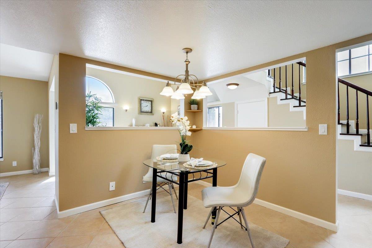 945 Oak Park Drive Morgan Hill, CA 95037 - Photo 19 of 46 a dining room with furniture and window