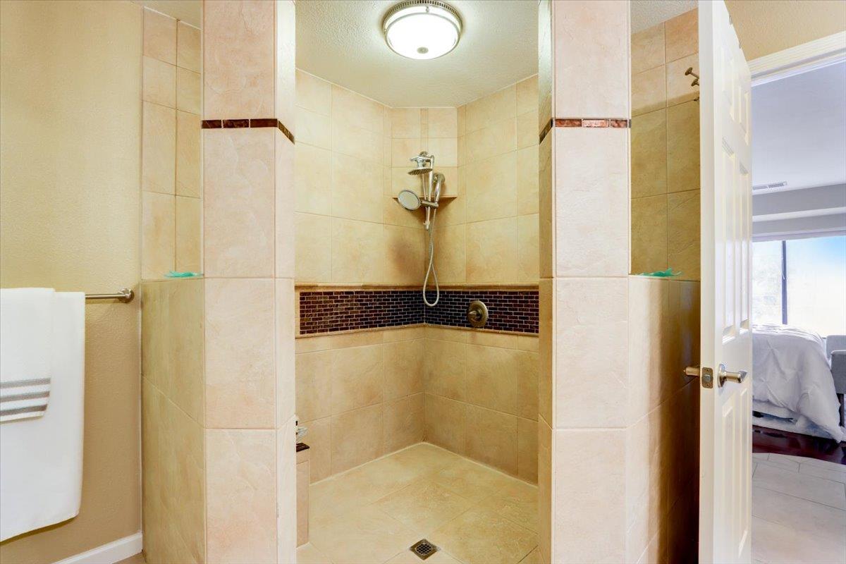 945 Oak Park Drive Morgan Hill, CA 95037 - Photo 28 of 46 a bathroom with a shower