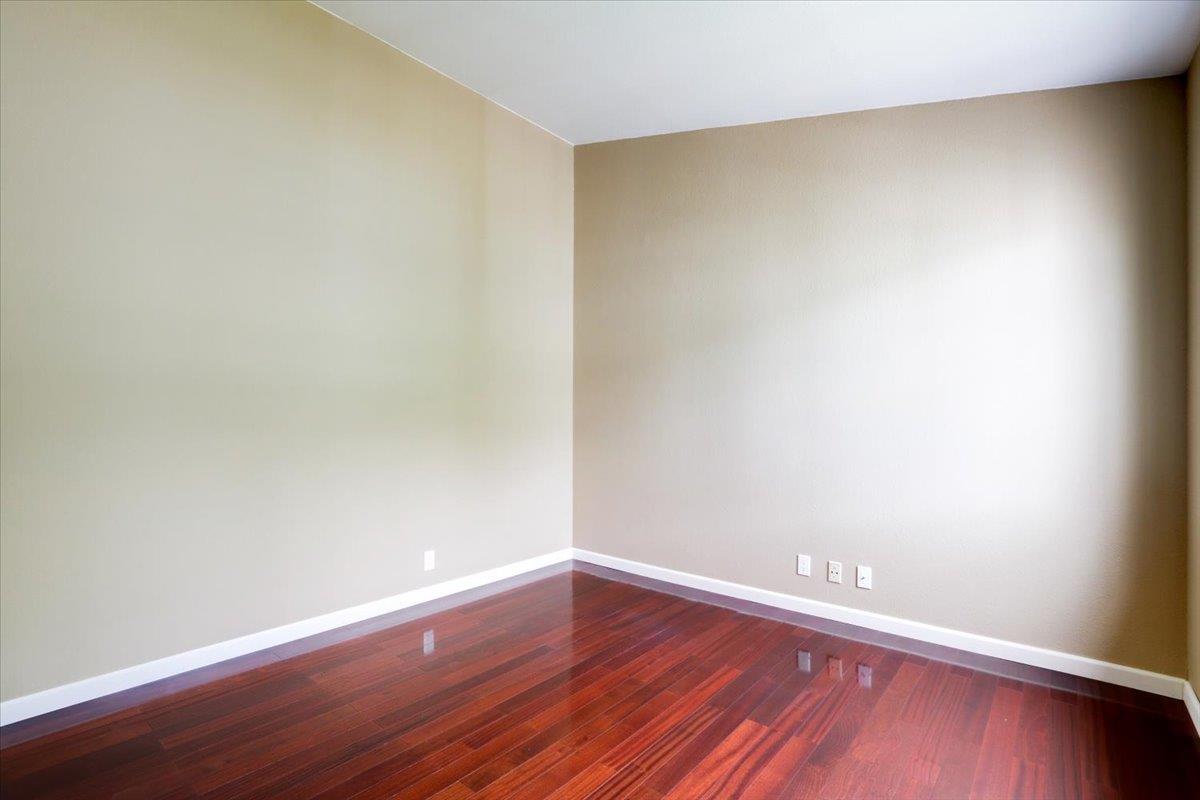 945 Oak Park Drive Morgan Hill, CA 95037 - Photo 30 of 46 a view of an empty room with wooden floor