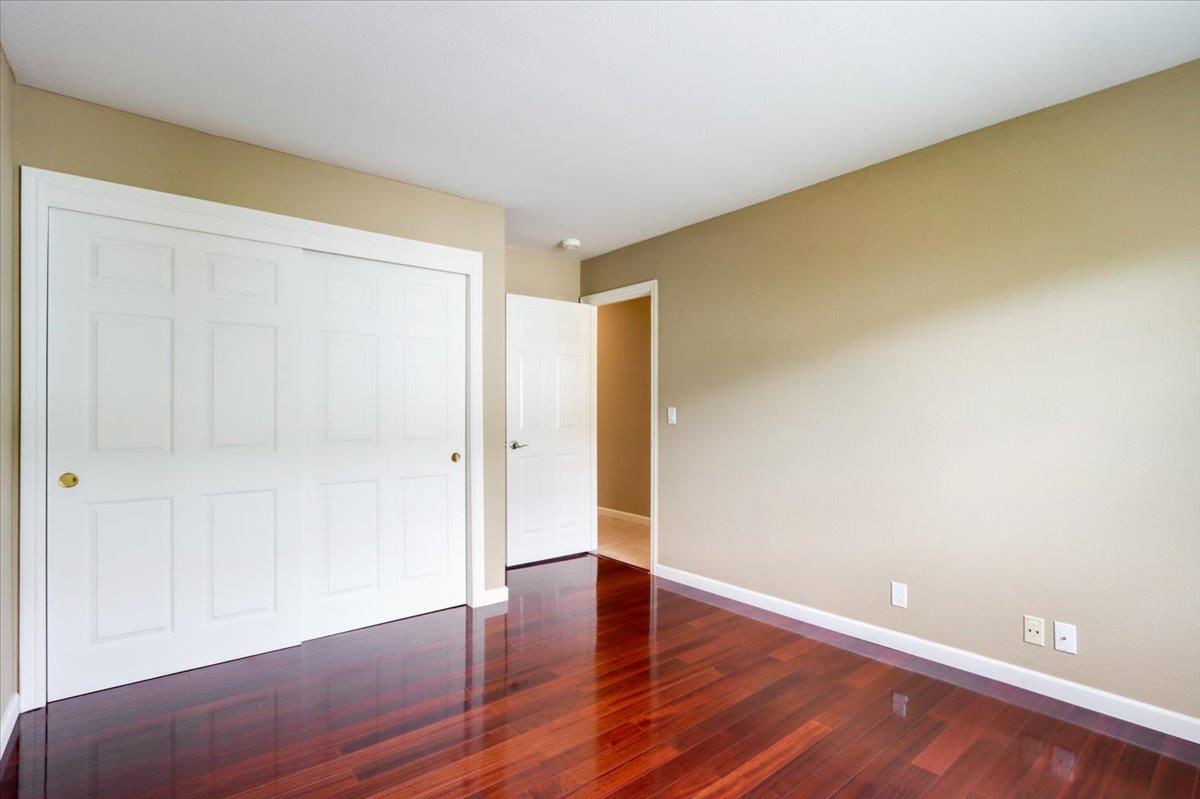945 Oak Park Drive Morgan Hill, CA 95037 - Photo 33 of 46 a view of an empty room with wooden floor