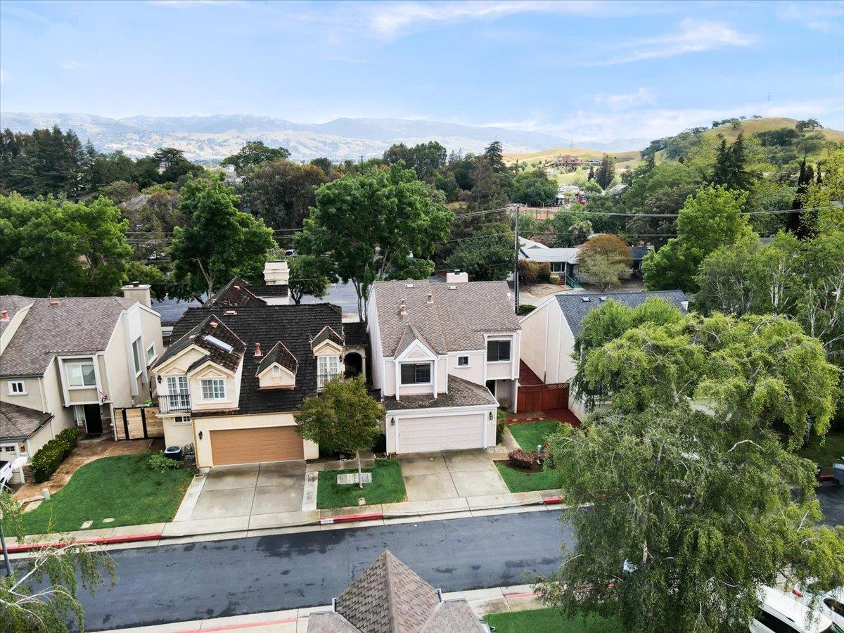 945 Oak Park Drive Morgan Hill, CA 95037 - Photo 38 of 46 an aerial view of residential houses with outdoor space
