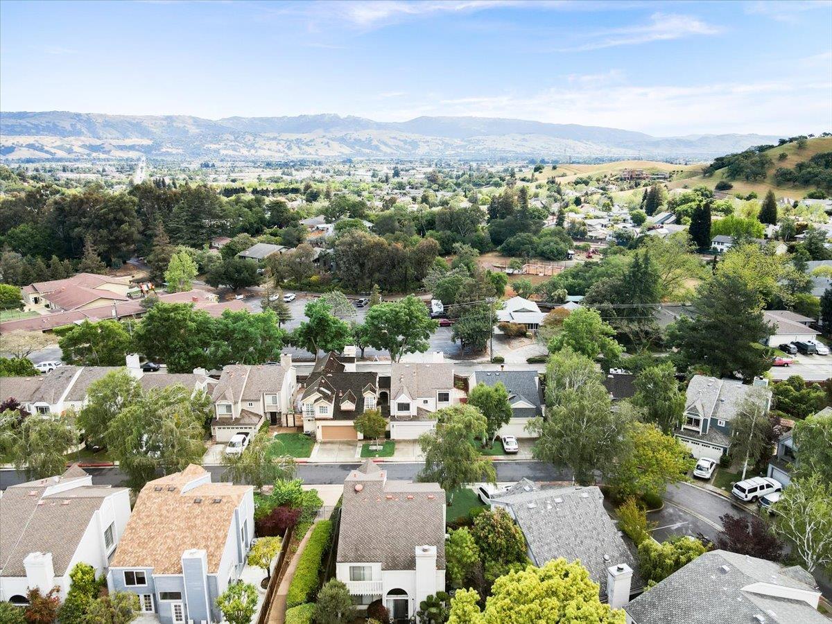 945 Oak Park Drive Morgan Hill, CA 95037 - Photo 40 of 46 an aerial view of a city with lots of residential buildings
