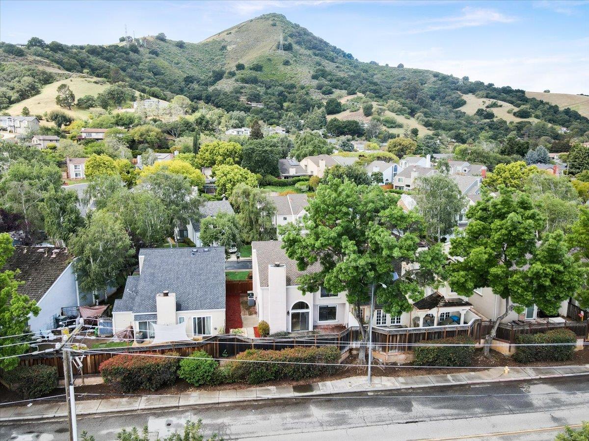945 Oak Park Drive Morgan Hill, CA 95037 - Photo 42 of 46 an aerial view of a house with a garden and lake view