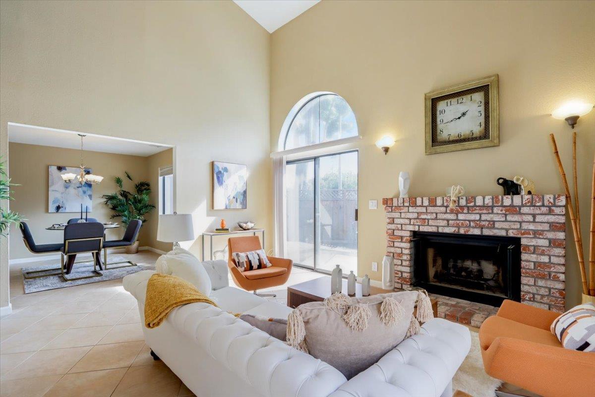 945 Oak Park Drive Morgan Hill, CA 95037 - Photo 6 of 46 a living room with furniture fireplace and window