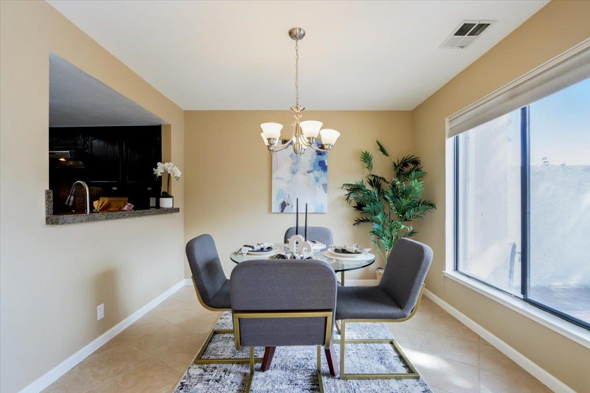 945 Oak Park Drive Morgan Hill, CA 95037 - Photo 10 of 46 a dining room with furniture and window
