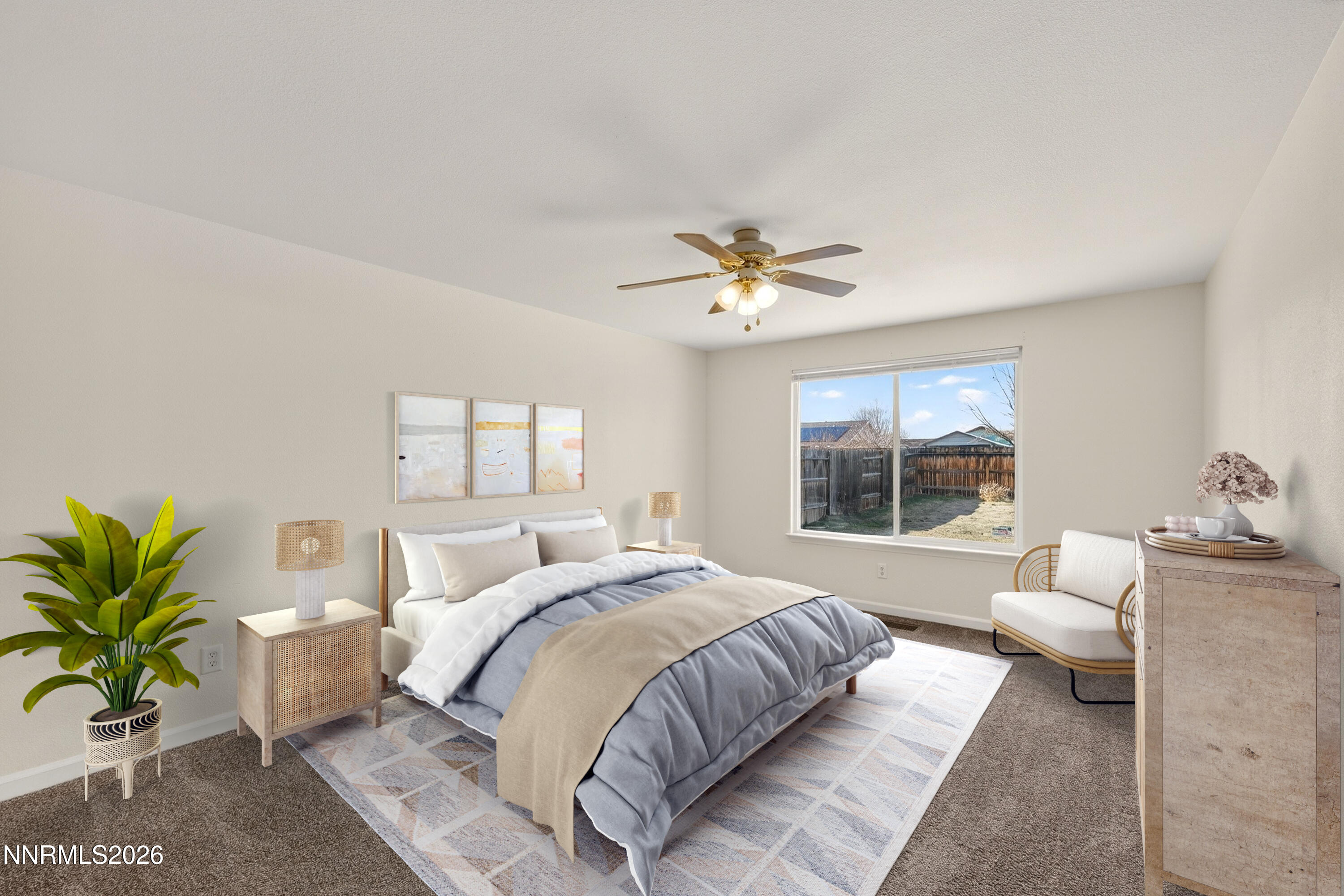 1222 Eagle Rock Road Fallon, NV 89406 - Photo 12 of 27 a spacious bedroom with a bed and a chandelier