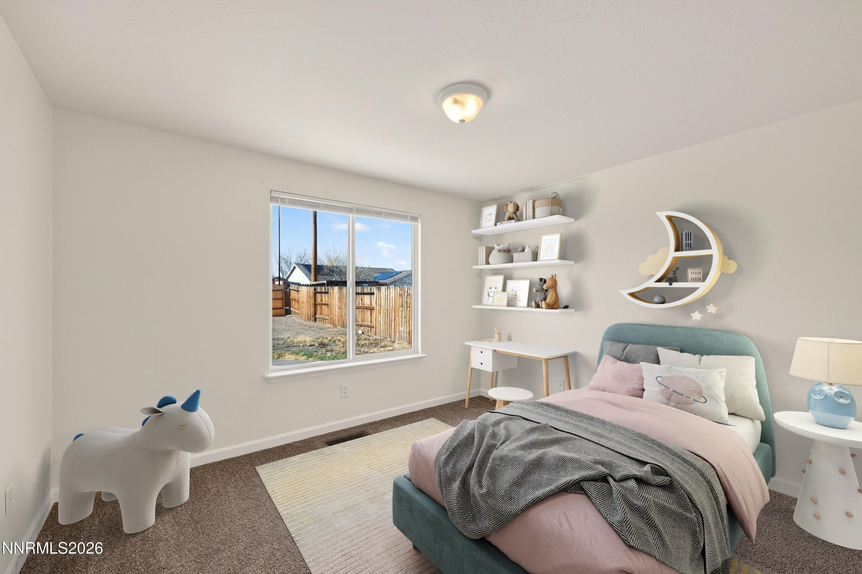 1222 Eagle Rock Road Fallon, NV 89406 - Photo 17 of 27 a bedroom with a bed and window