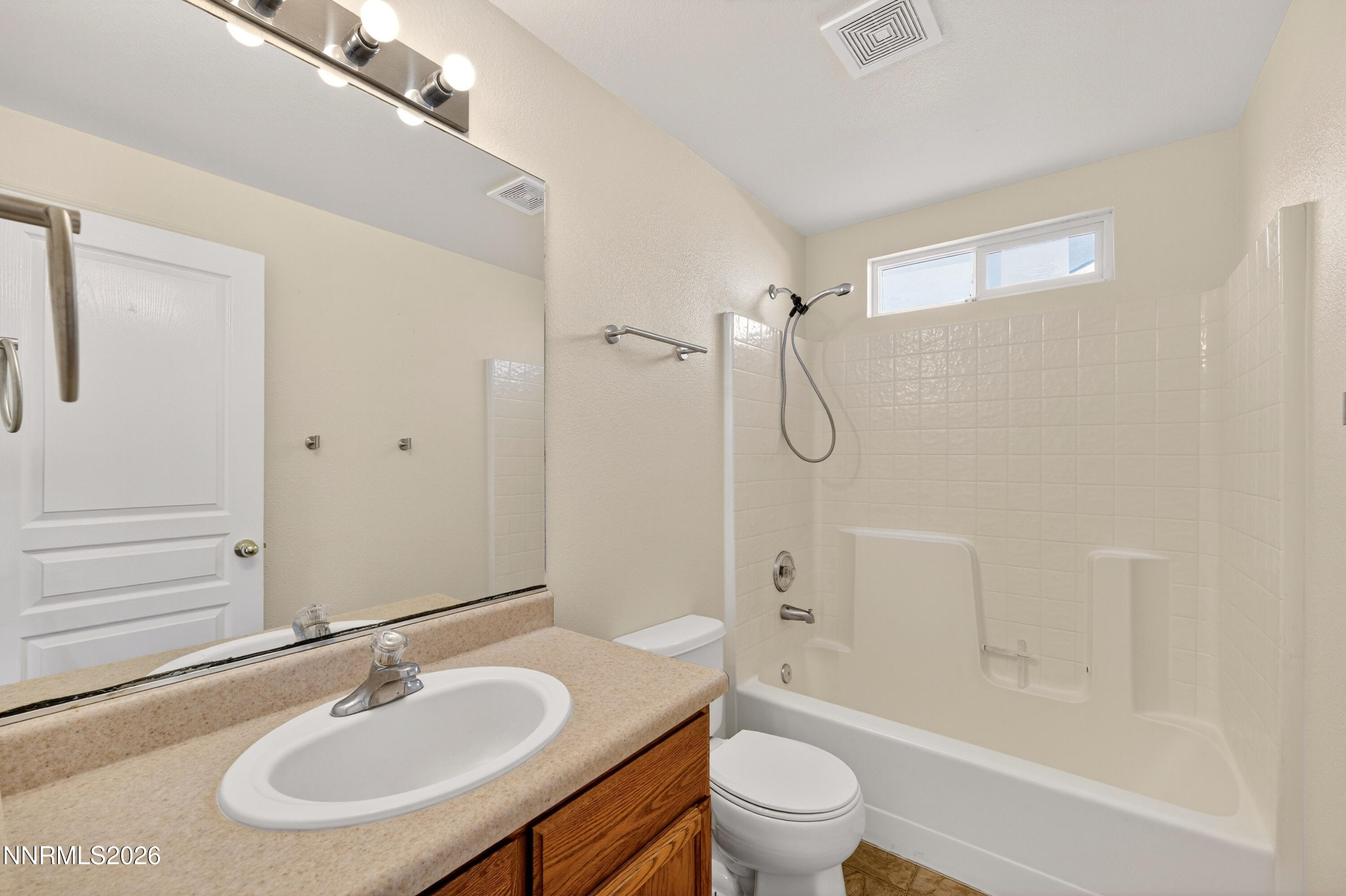 1222 Eagle Rock Road Fallon, NV 89406 - Photo 20 of 27 a bathroom with a sink toilet tub and shower