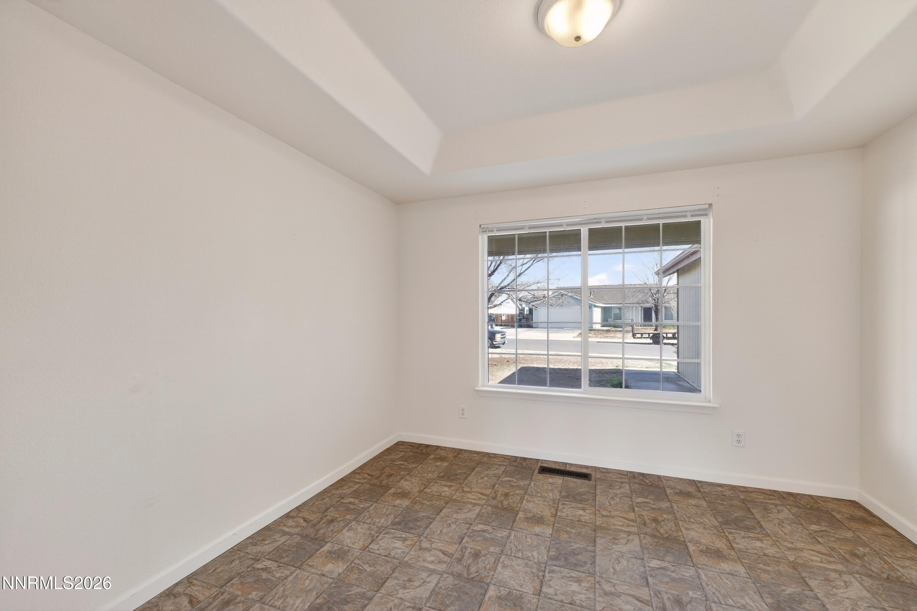 1222 Eagle Rock Road Fallon, NV 89406 - Photo 22 of 27 an empty room with windows
