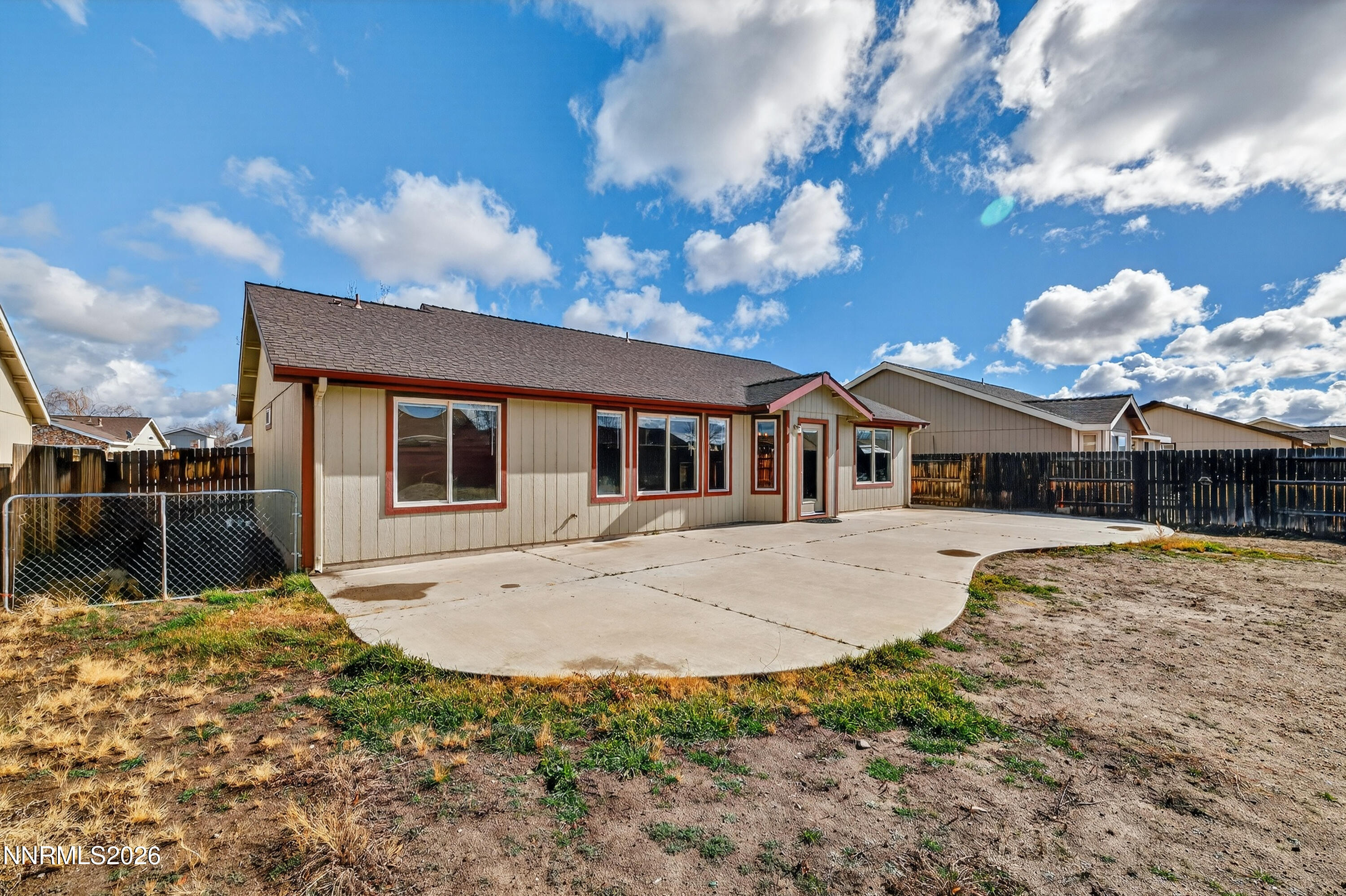 1222 Eagle Rock Road Fallon, NV 89406 - Photo 25 of 27 a front view of a house with a garden