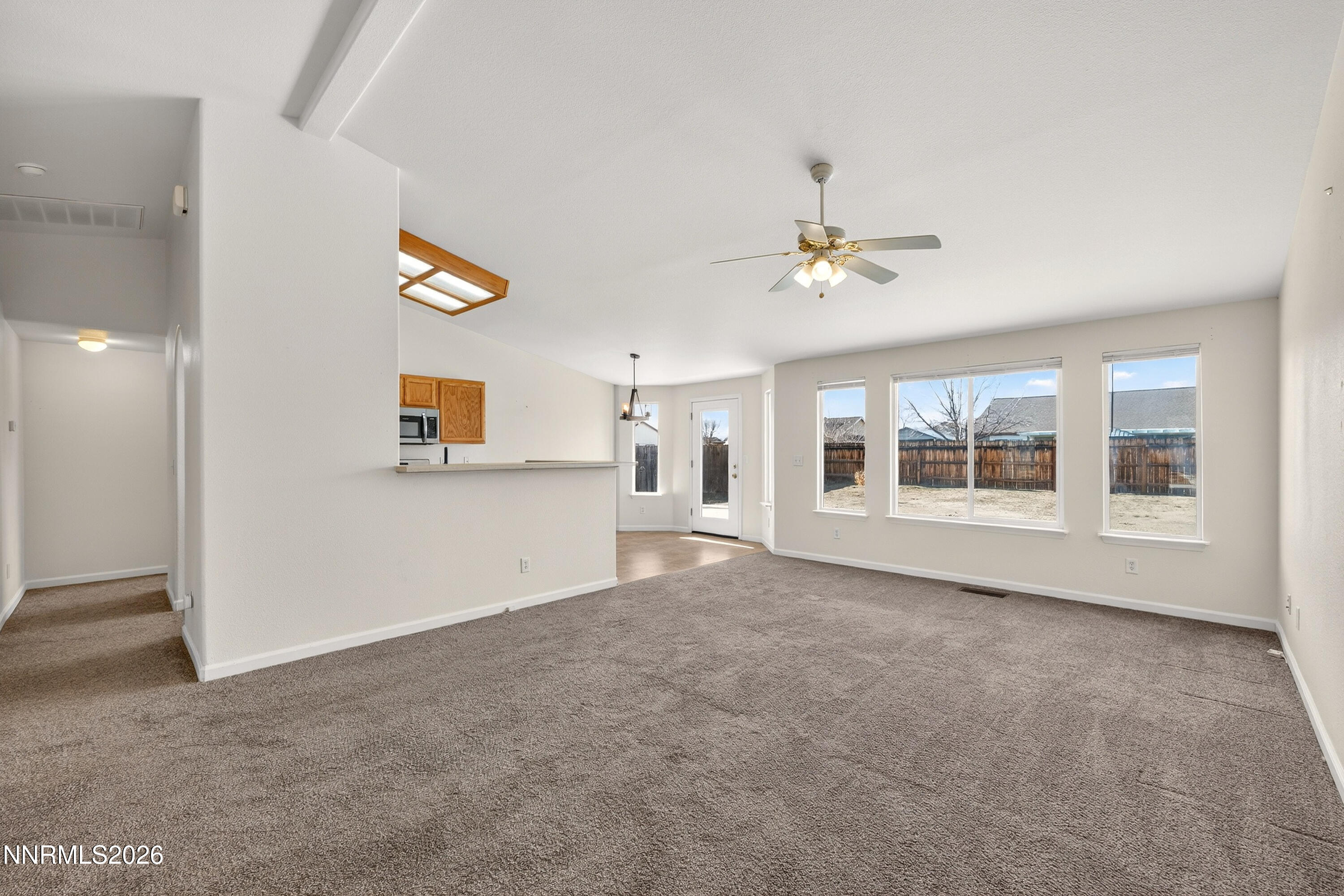 1222 Eagle Rock Road Fallon, NV 89406 - Photo 4 of 27 a view of an empty room with a window