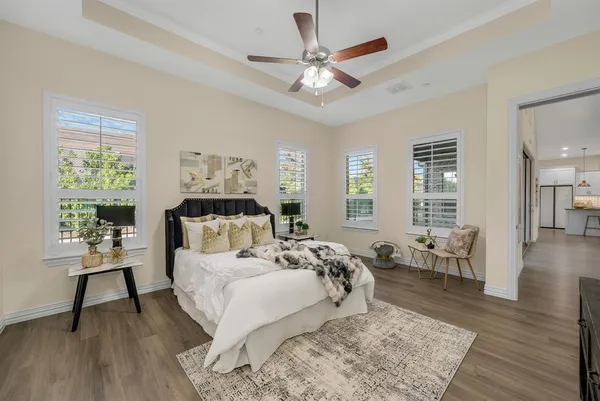 a bed room with a bed and a chair