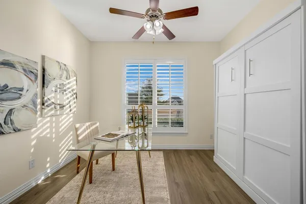a view of a livingroom with furniture and window