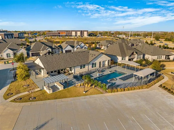 an aerial view of a house with a garden