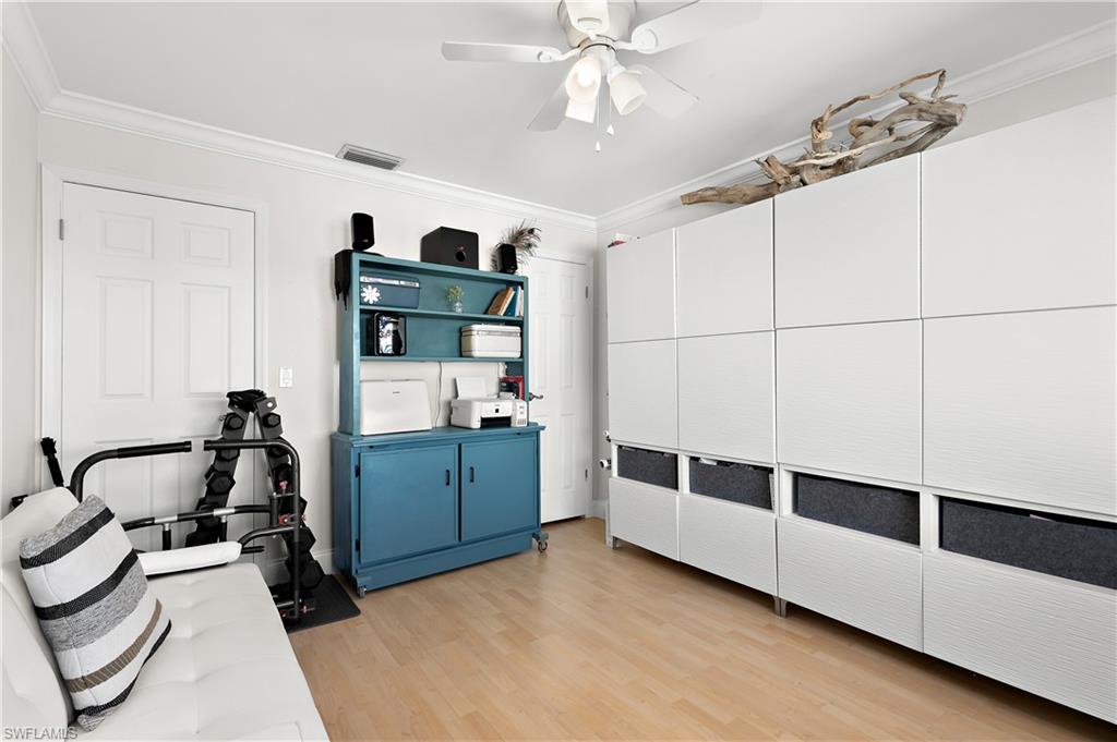 27 Watercolor Way, Unit 27 Naples, FL 34113 - Photo 19 of 36 a living room with furniture