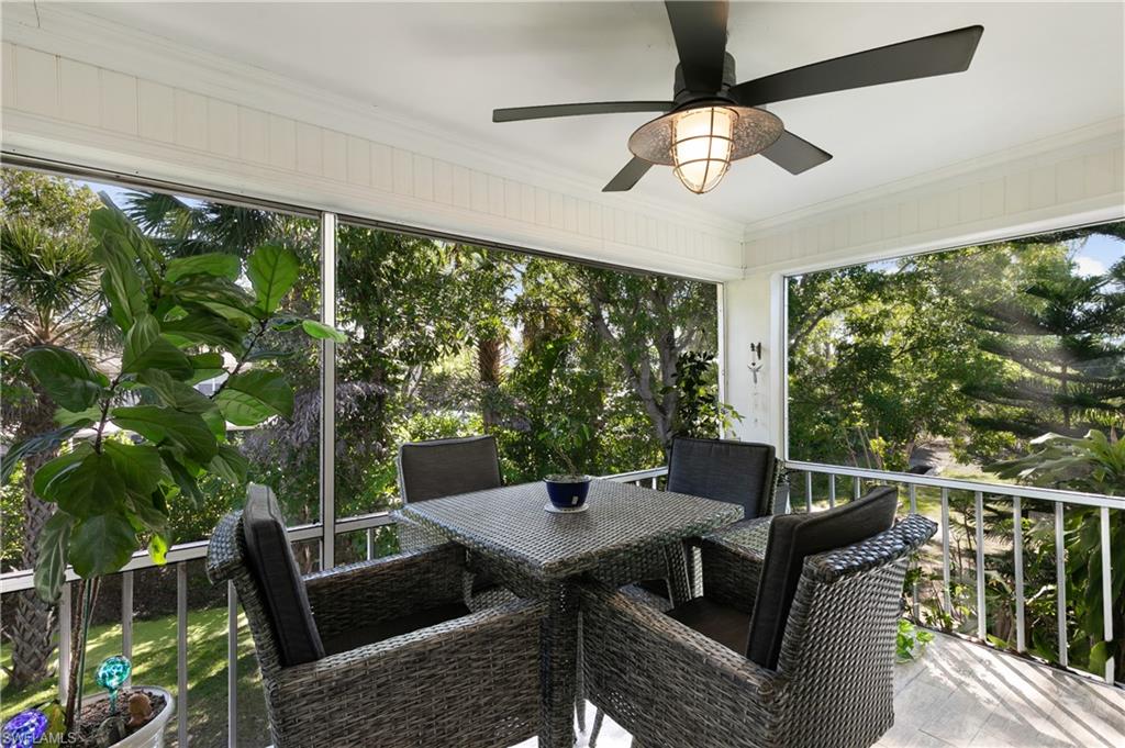27 Watercolor Way, Unit 27 Naples, FL 34113 - Photo 2 of 36 a view of a balcony with furniture