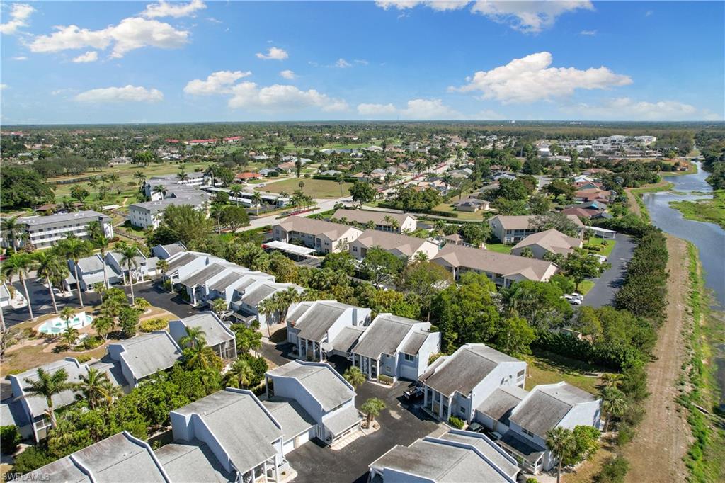 27 Watercolor Way, Unit 27 Naples, FL 34113 - Photo 29 of 36 an aerial view of a residential houses with city view