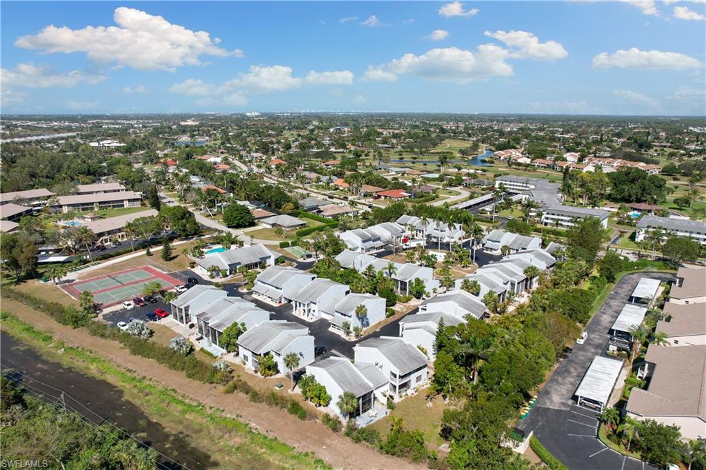 27 Watercolor Way, Unit 27 Naples, FL 34113 - Photo 30 of 36 an aerial view of a city