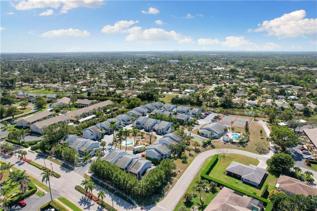 27 Watercolor Way, Unit 27 Naples, FL 34113 - Photo 32 of 36 an aerial view of a city