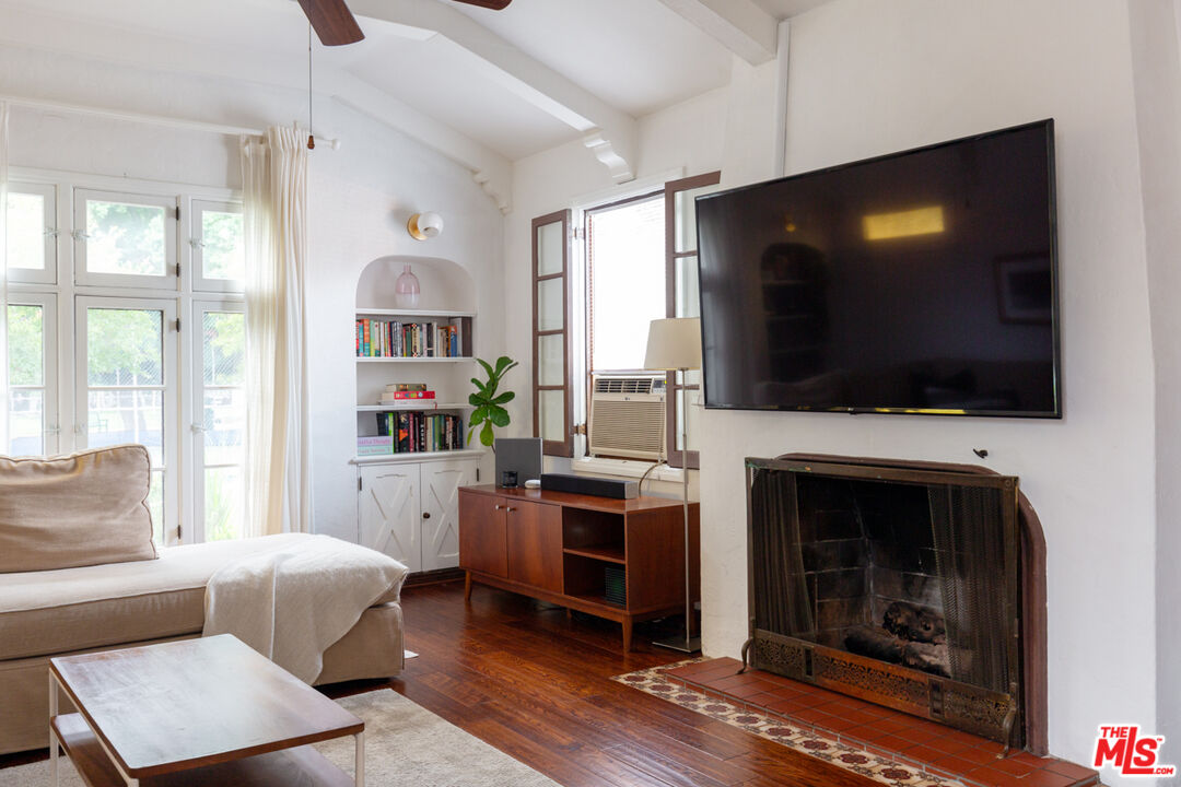708 South Cedar Street Glendale, CA 91205 - Photo 13 of 38 a living room with furniture and a flat screen tv