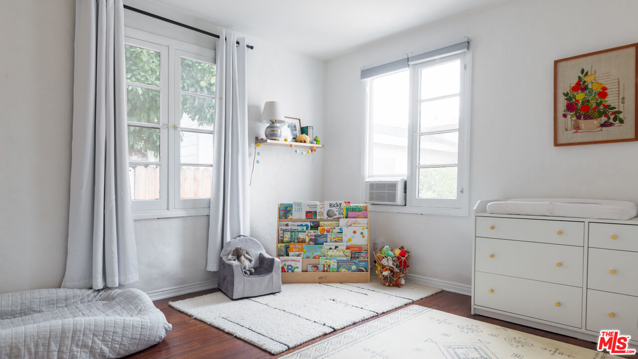 708 South Cedar Street Glendale, CA 91205 - Photo 28 of 38 a bedroom with a bed and a window