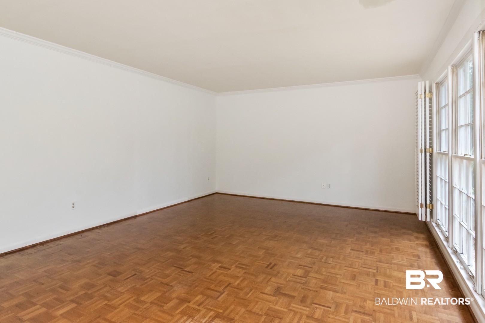 3755 Claridge Road North Mobile, AL 36608 - Photo 4 of 38 Spare room with baseboards and ornamental molding