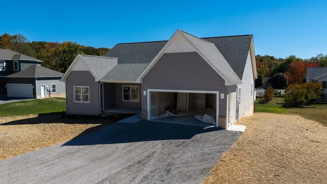 a house view with a garden space