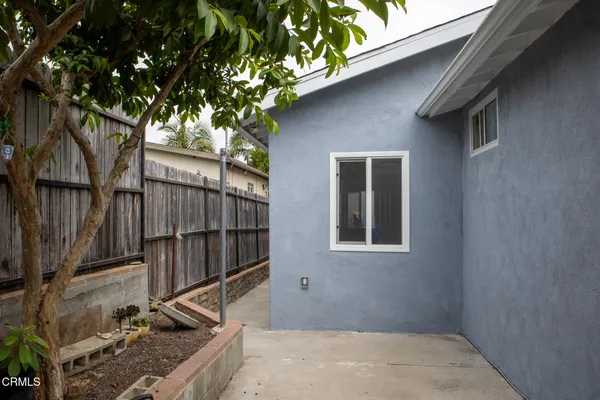 a house with trees in front of it