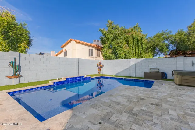 a view of a kitchen with a large pool